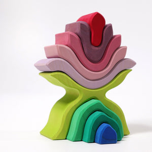 The flower pieces are slightly pushed forward to create dimension.