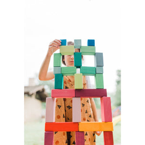 child build a structure the size of her with the large stepped pyramid