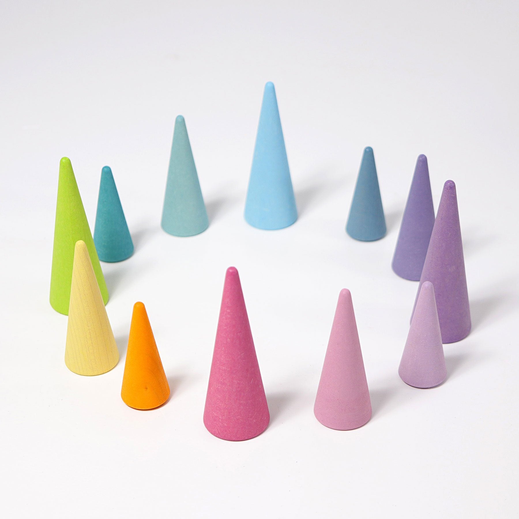 pastel forest; 12 colored cones in 3 varying heights