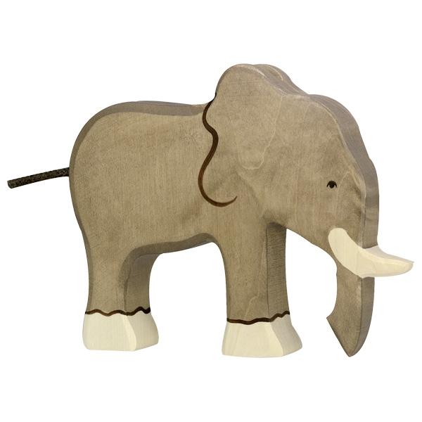 Large wooden elephant figure painted grey with white feet and a white trunk. Dark gray rope used for the tail.