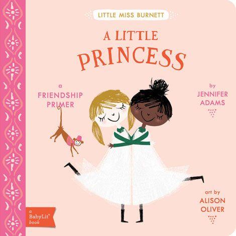 A little princess book cover. The cover is pink with two girls in dresses hugging.