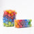 36 large wooden beads in rainbow colors. Colors include shades of yellow, orange, red, purple, blue, and green.