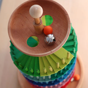 The top bowl of the ball run has two holes so you can race two balls