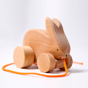 bobbing rabbit hans pull toy, natural wood with orange string