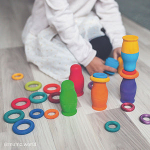 rainbow rings being stacked with rainbow mushrooms