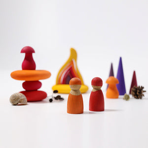 scene created with fire pebbles, rainbow mushrooms, peg people, forest, and firebuilding set