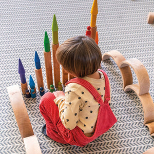 child building with natural rollers, rainbow rollers, rainbow friends, rainbow forest, and natural rainbow