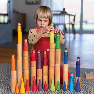 child building with natural rollers, rainbow rollers, rainbow friends, and rainbow forest