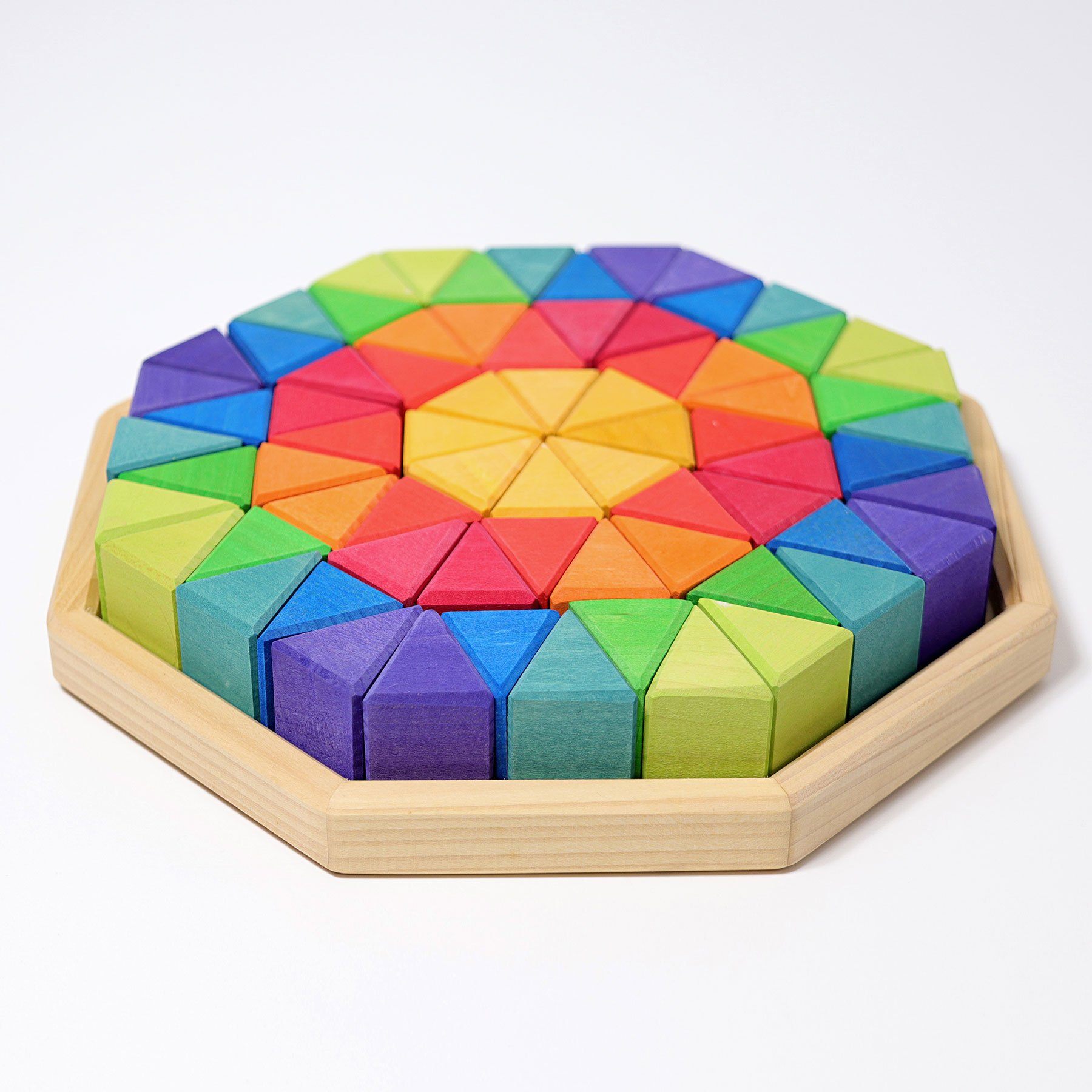 72 rainbow colored pieces in a large wooden octagon frame.
