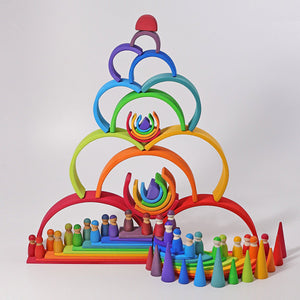 large rainbow stacked with other grimm's rainbow-colored building sets