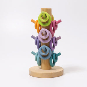 pastel building rings sorter with pastel rings on corresponding colored dowels