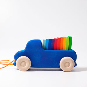 royal blue pull along truck with rainbow slats in trunk