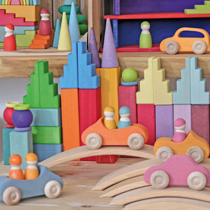 stepped roofs being used as roofs on top of building blocks in a city scene.