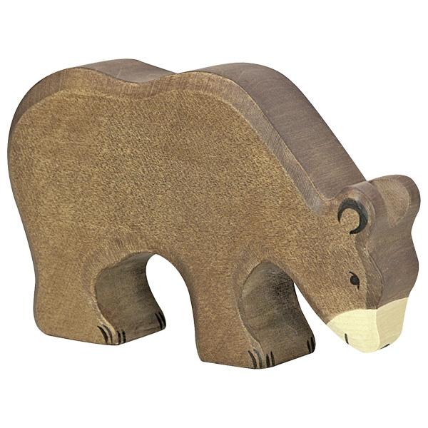 A bear wooden figure painted brown with a white nose/mouth and dark paint used for face and claw detailing. The bear is on all fours with its head down like its eating.