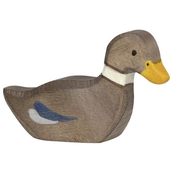 A duck wooden figure painted primarily grey with a yellow beak, and two blue paints used for the wings.