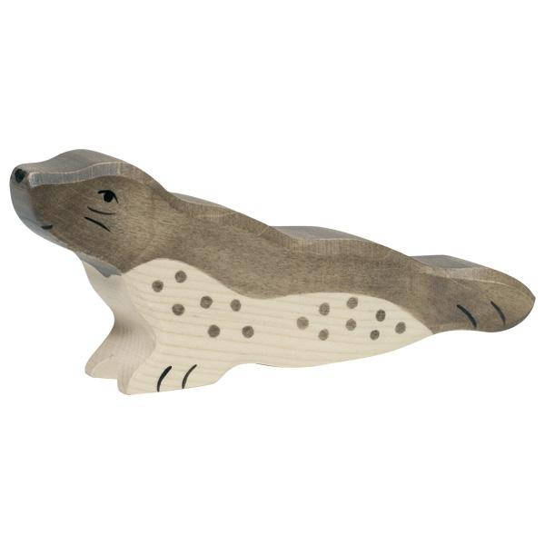 A seal wooden figure with a grey back and white/natural underbelly and chest with grey spots. Black paint is used to detail the face and feet