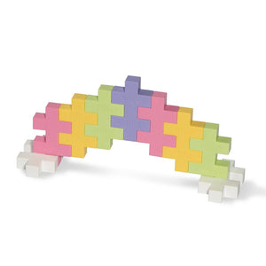 BIG plus-plus pieces are used to create a pastel rainbow and clouds.