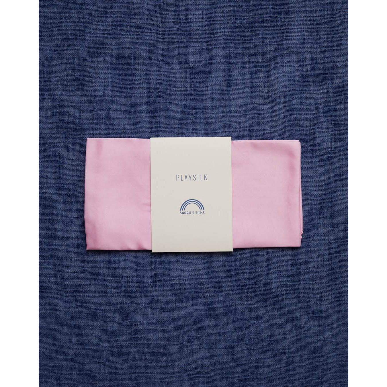 A silk scarf in light pink.