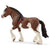 detailed clydesdale mare with red bow on tail and red bow on braided mane