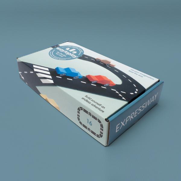 Image of the Express way packaging. Packaging has blue sides and images of the track on the front.