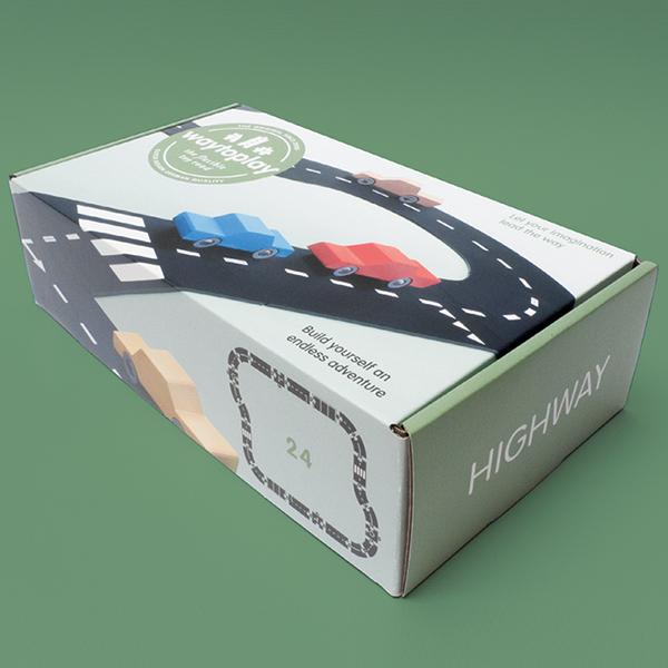 Image of Highway packaging. Packaging has green sides and a picture of the track on the front.