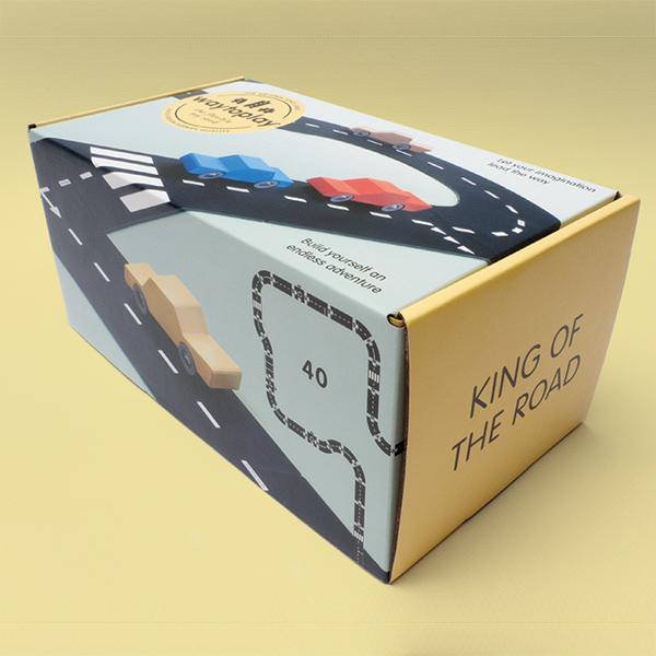 King of the Road packaging. Packing has yellow sides and pictures of the track.
