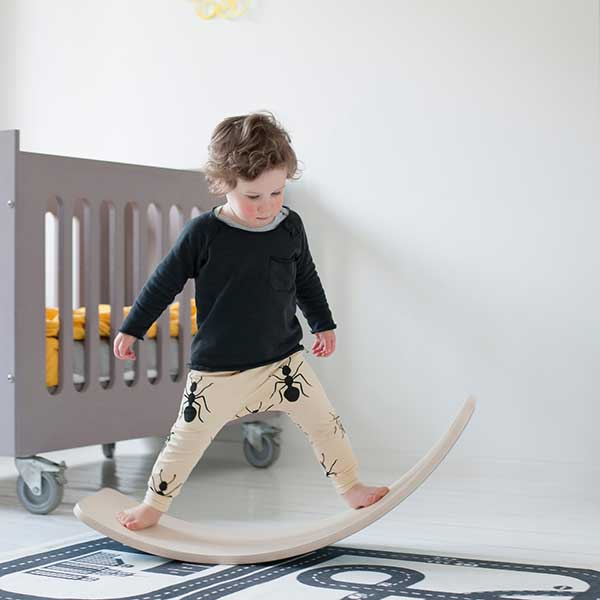 Wobbel Balance Board with gray felt on the bottom.